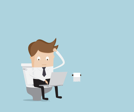 businessman working with laptop in toilet