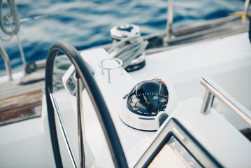 Sailing yacht control cockpit, wheel and implement. 