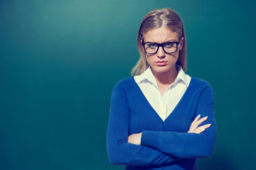 Portrait of young authoritative teacher
