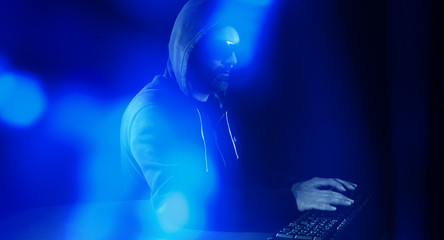 Cyber hacker hacking network blue lights