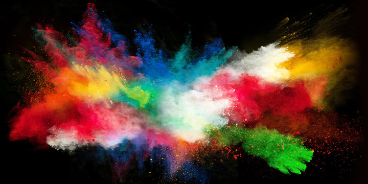 Launched colorful powder on black background © Lukas Gojda