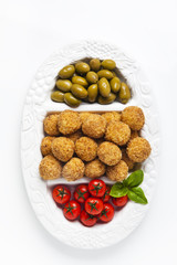 Healthy Italian Appetizer with Risotto Balls Arancini , green Ol