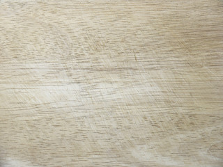Fototapeta premium Old and used natural wooden cooking board with cuts