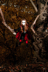 Fototapeta premium Cute little girl dressed in Halloween costume