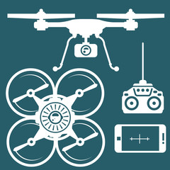 Fototapeta na wymiar Silhouette of quadcopter and remote contro and smartphone