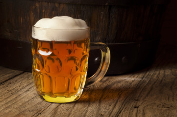 Still life: old wooden pin of beer