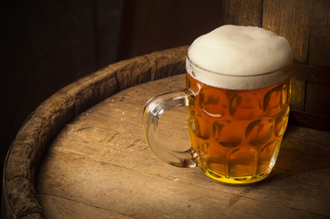 Still life: old wooden pin of beer