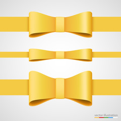 Holiday golden ribbon and bow.