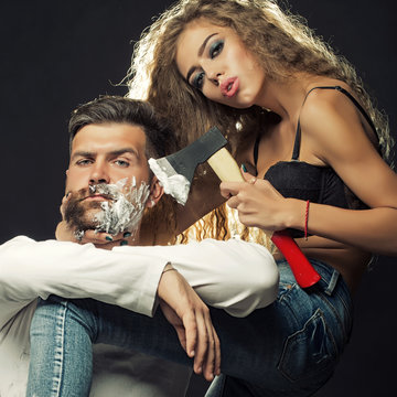 Woman Shaving Man