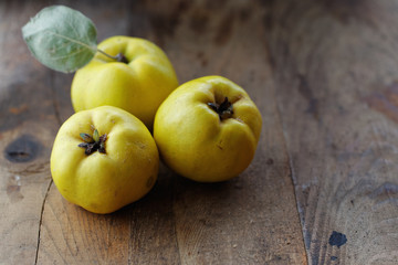 Quince on wooden table
