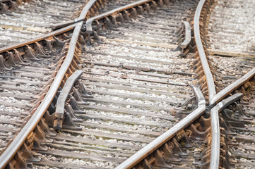 rusty railroad tracks and junction points