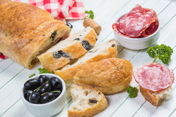 Bread with black olives salami, Italian snacks