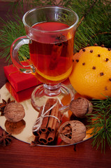 Hot winter drinks. Black tea with lemon, cinnamon, star anise se
