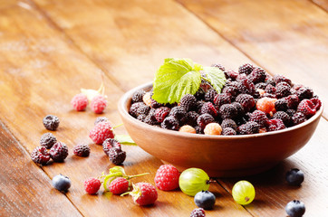 Ceramic bowl of organic blackberries