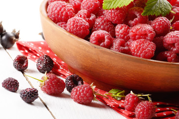 Ceramic bowl with organic raspberries