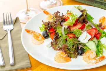Fresh green salad with prawns