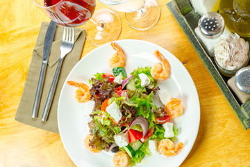 Fresh green salad with prawns