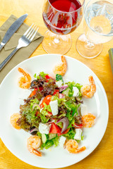 Fresh green salad with prawns
