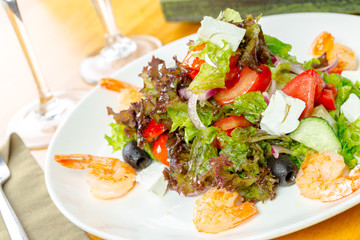 Fresh green salad with prawns