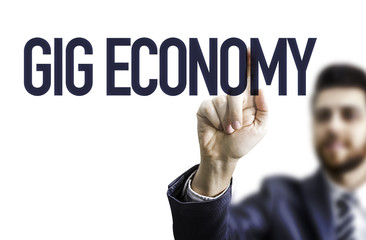 Business man pointing the text: GIG Economy