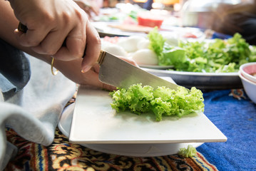 Hand cutting vegetable