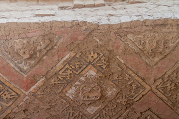 Decorated wall at archeological site Huaca del Sol y de la Luna (Temple of the Sun and the Moon) in Trujillo, Peru. Site was built in Moche period.