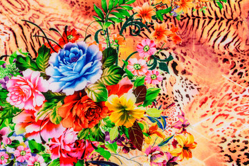 Fototapeta na wymiar texture of print fabric striped leopard and flower