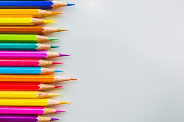 Colour pencils isolated on white background close up