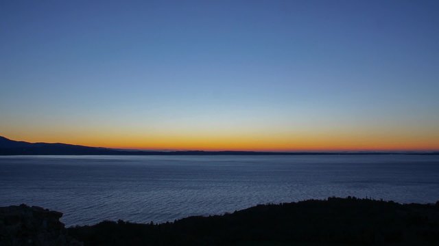 Alba sul lago in time lasse