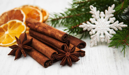 different kinds of spices and dried oranges