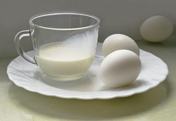 Still life with eggs in pastel shades of white.