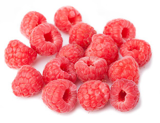 group of raspberries isolated on a white background