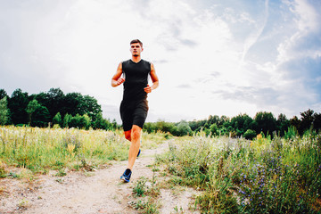 Young man training trial running