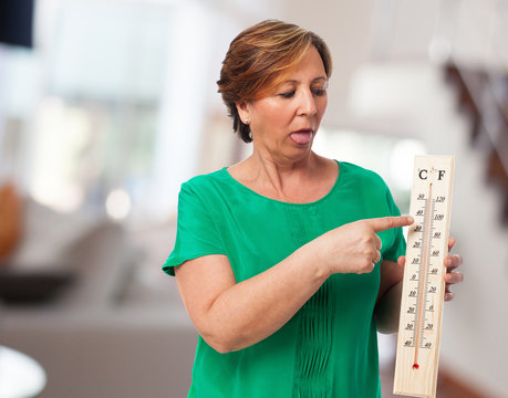 Portrait Of A Mature Woman Sweating Because Of The Heat