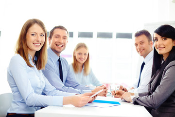 Group of happy business people at meeting