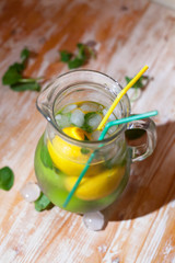 lemon and lime in a jug