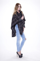 Young slim sexy woman in fashionable dress isolated on white bac