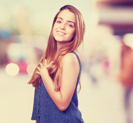 young cute woman smiling on a white background