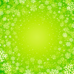 Christmas background of snowflakes in green colors