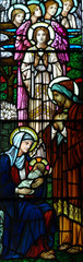 The Nativity in stained glass (Mary, Jesus, Joseph and angels)