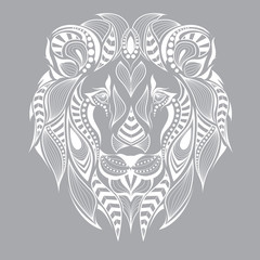 Patterned head of the lion on the grey background. African / indian / totem / tattoo design. It may be used for design of a t-shirt, bag, postcard and poster.