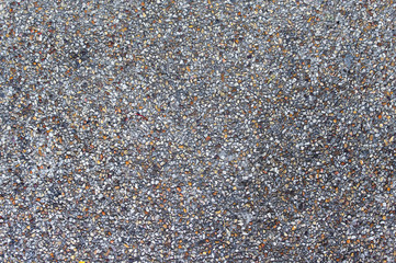 The background stone wall