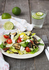 Salad with grilled eggplant, tomatoes and feta cheese