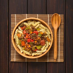 Vegan goulash made of soy meat (textured vegetable protein), capsicum, tomato and onion served on...