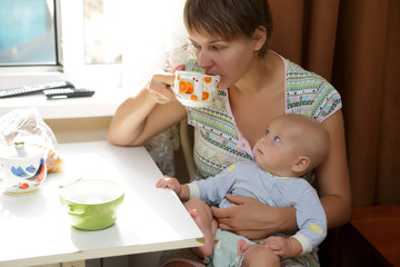 Mother with baby on your lap