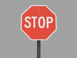 stop sign on gray background
