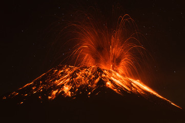 A powerful eruption of the Tungurahua volcano in Ecuador sends a massive plume of smoke, magma, and lava into the sky. © Ammit