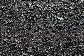Close-up asphalt at the road under construction.