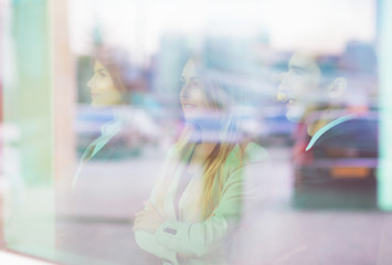 Group of successful businesspeople standing near the window
