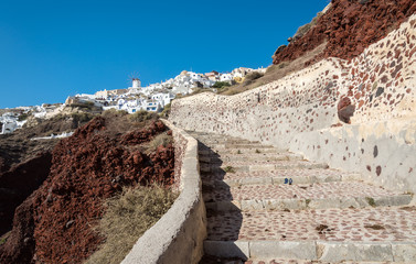 Steps up to Oia town from old port at Santorini island